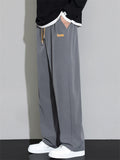 Men's Autumn Loose Fit Drape Drawstring Casual Pants with Pockets